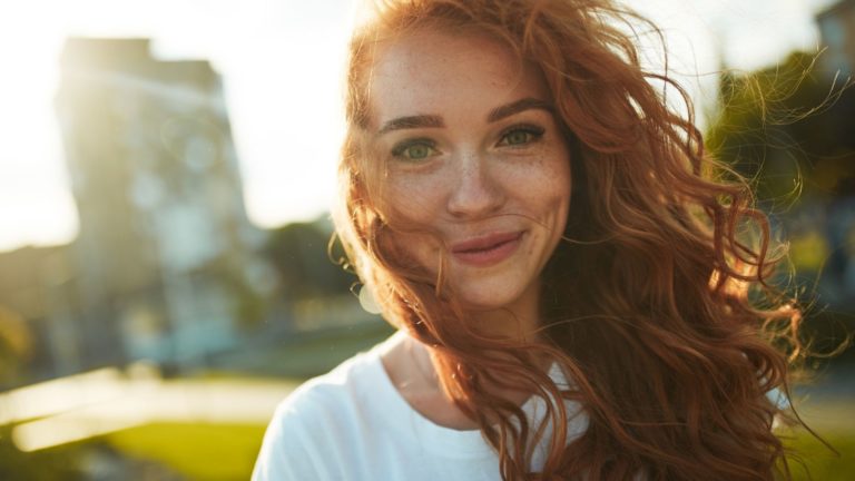 teenage girl with curly red hair