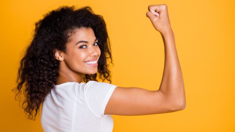 african american woman flexing