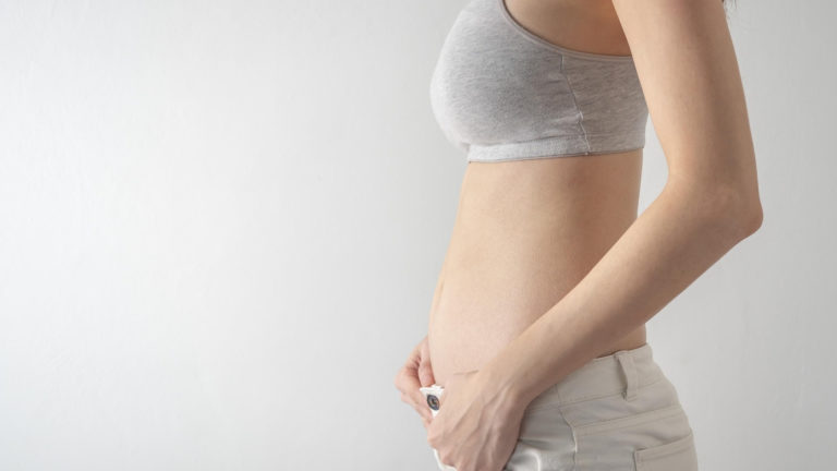 woman in the early stages of pregnancy