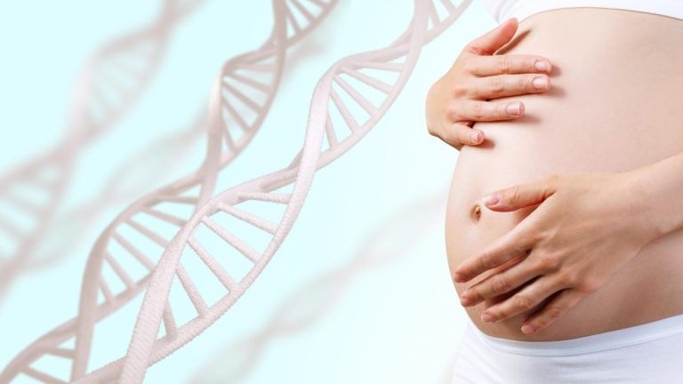 pregnant woman next to DNA strands