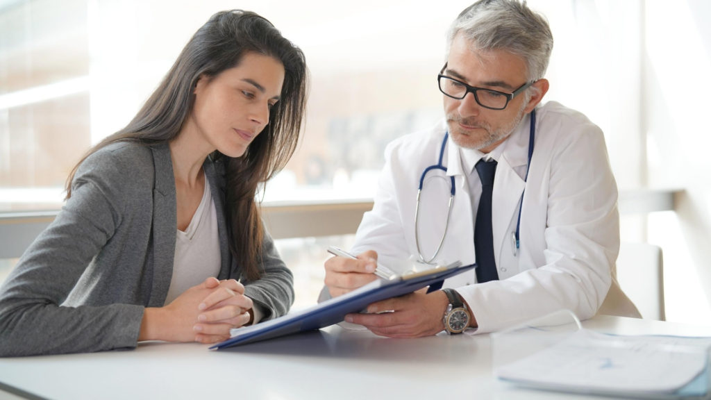 woman talking with her doctor