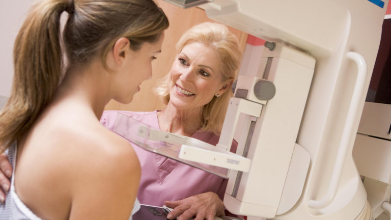 woman receiving a mammogram