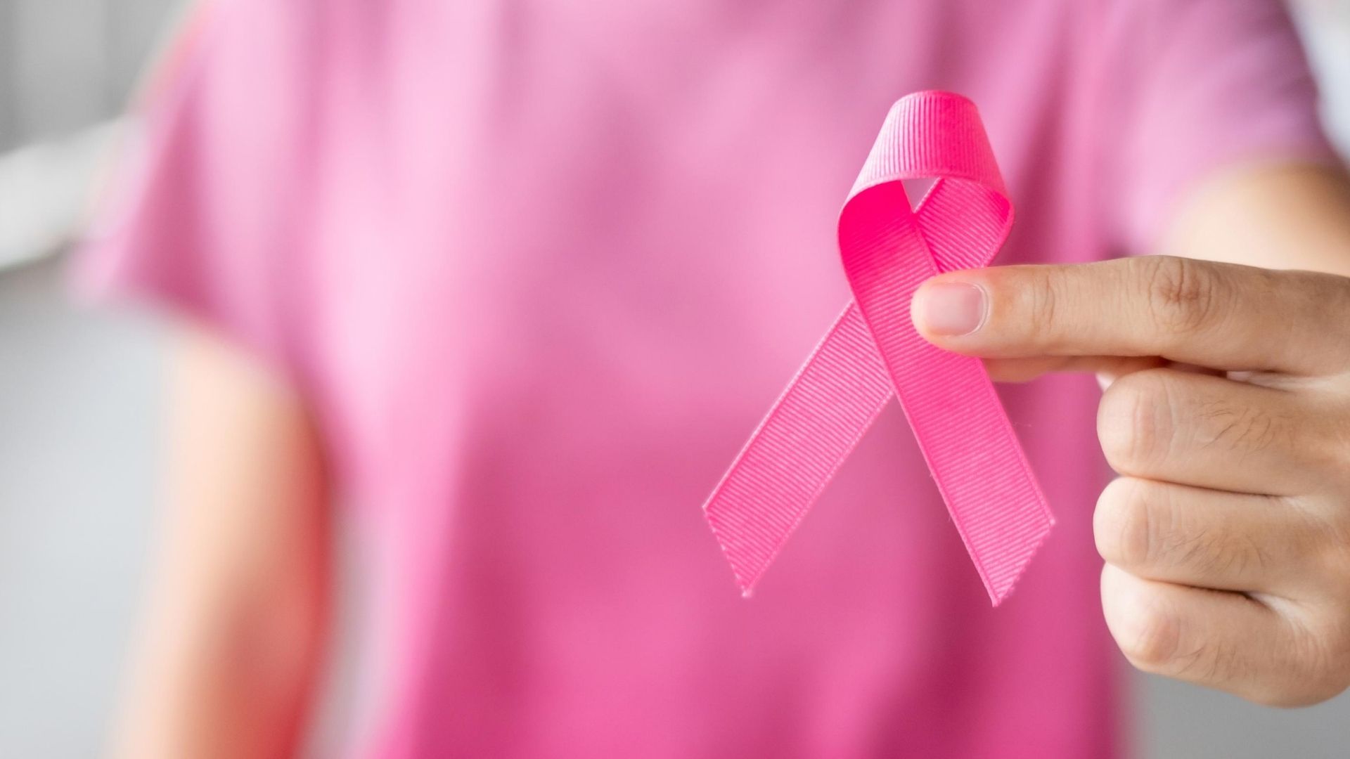 Wearing a Pink Ribbon for Breast Cancer? Here's How It Began