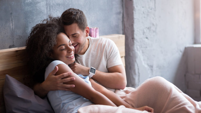 couple sitting in bed