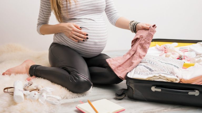 pegnant owman packing a hospital bag