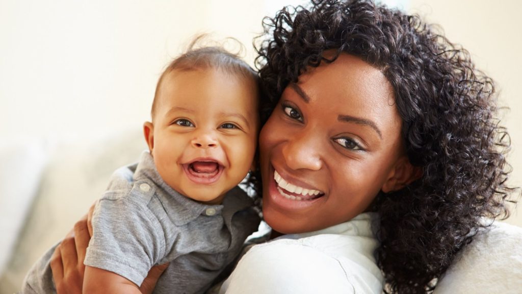 african american woman with her baby