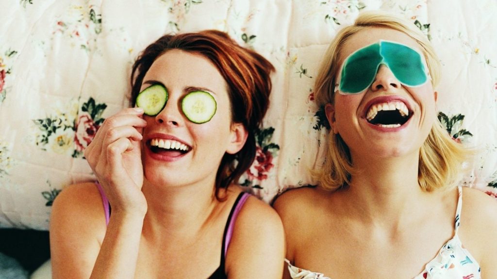 women in their 20s doing face masks