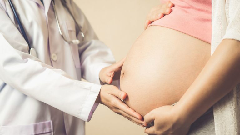 pregnant woman and doctor
